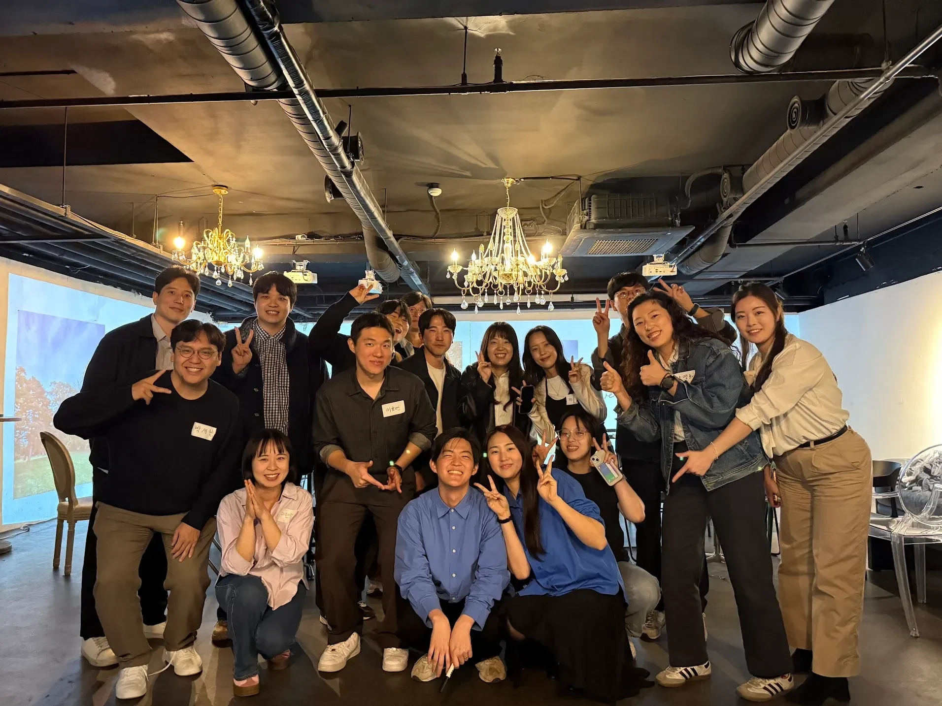 Friends gathered for a group photo at our wedding invitation party